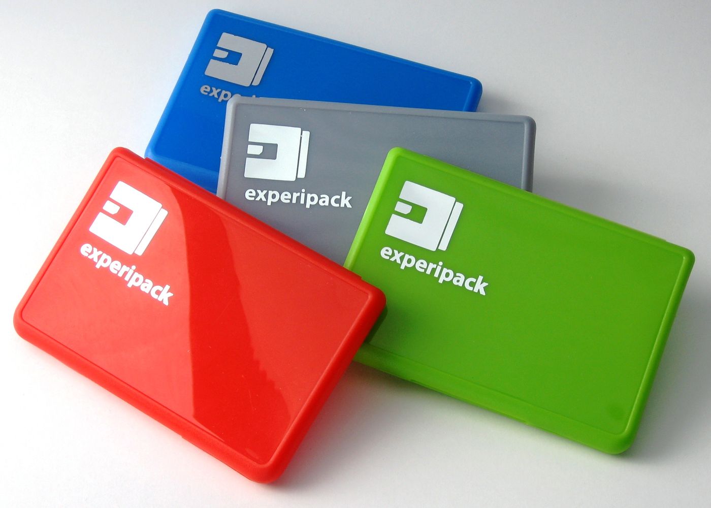 Red, grey, green and blue plastic SIM boxes with hot-foil logo