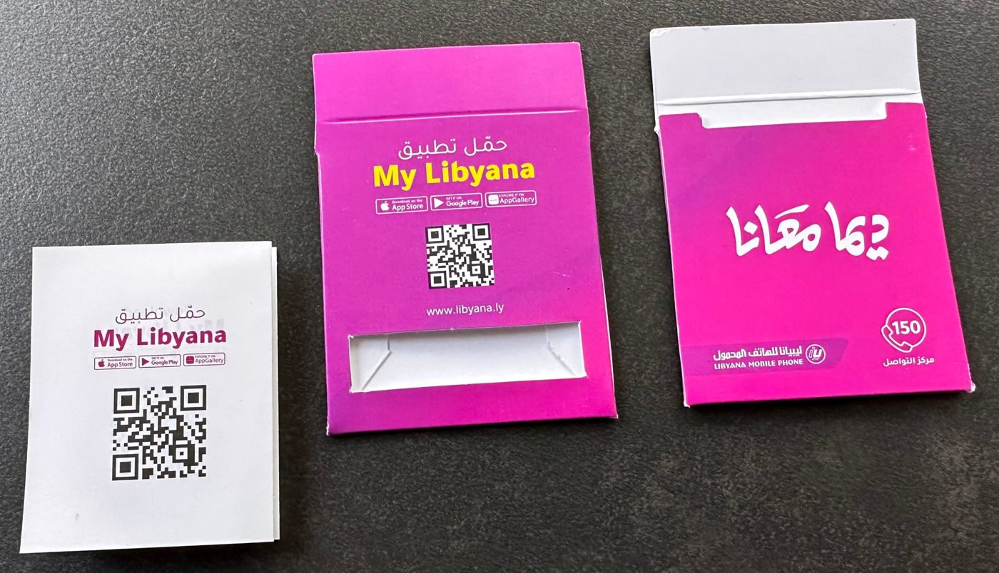 Half-card SIM pack shown front and back, with a folded leaflet